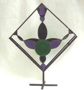 stained glass geometric design on stand