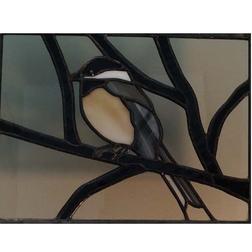 stained glass back capped chickadee